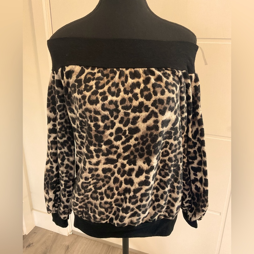COCO & MAIN Animal Printed top with rounded on off the shoulder neckline.